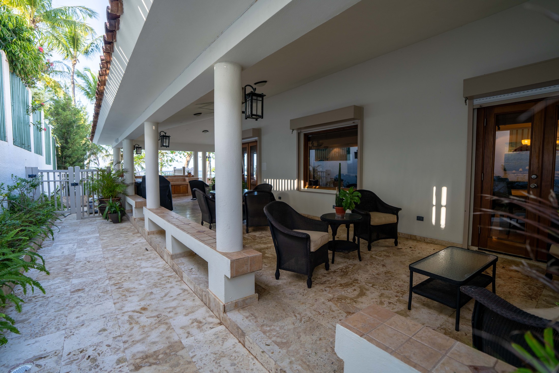 Wrap-around covered porch with seating